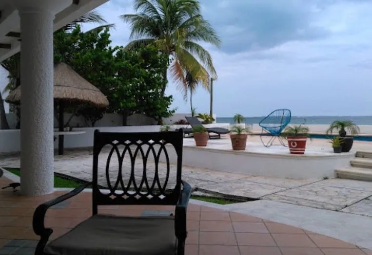 Historical photograph of Clear Sky Recovery's ocean-facing pool terrace in Cancun