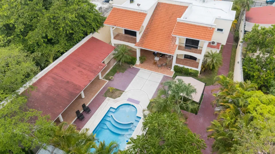 Aerial view of the MindScape Retreat house, courtyard and swimming pool in Cozumel