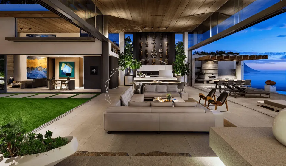 Open living area with timber ceiling, lounge seating and coastal views on the Cape Town program page.